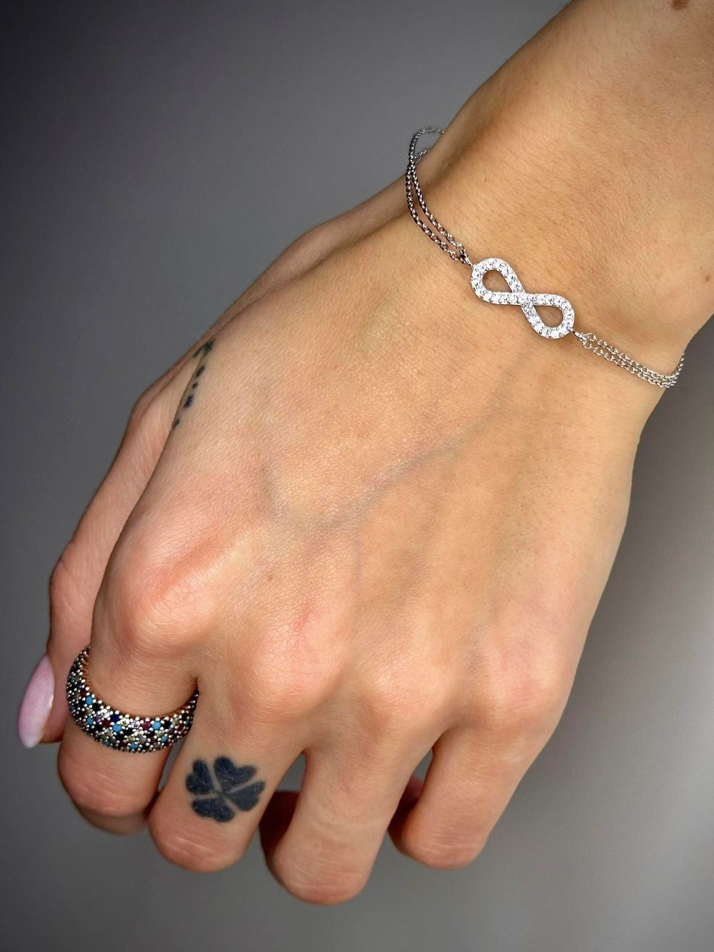 Sterling Silver Rhodium Plated CZ Infinity Bracelet