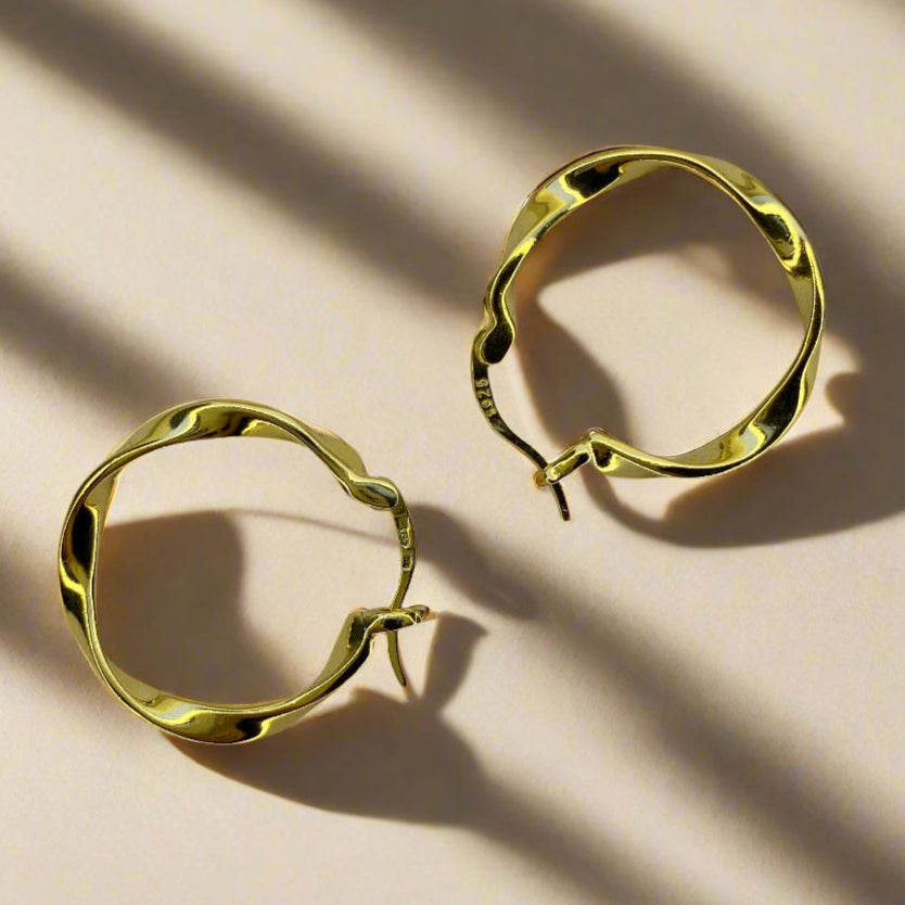 Sidabrinės auksuotos suktos 2 cm rinkutės