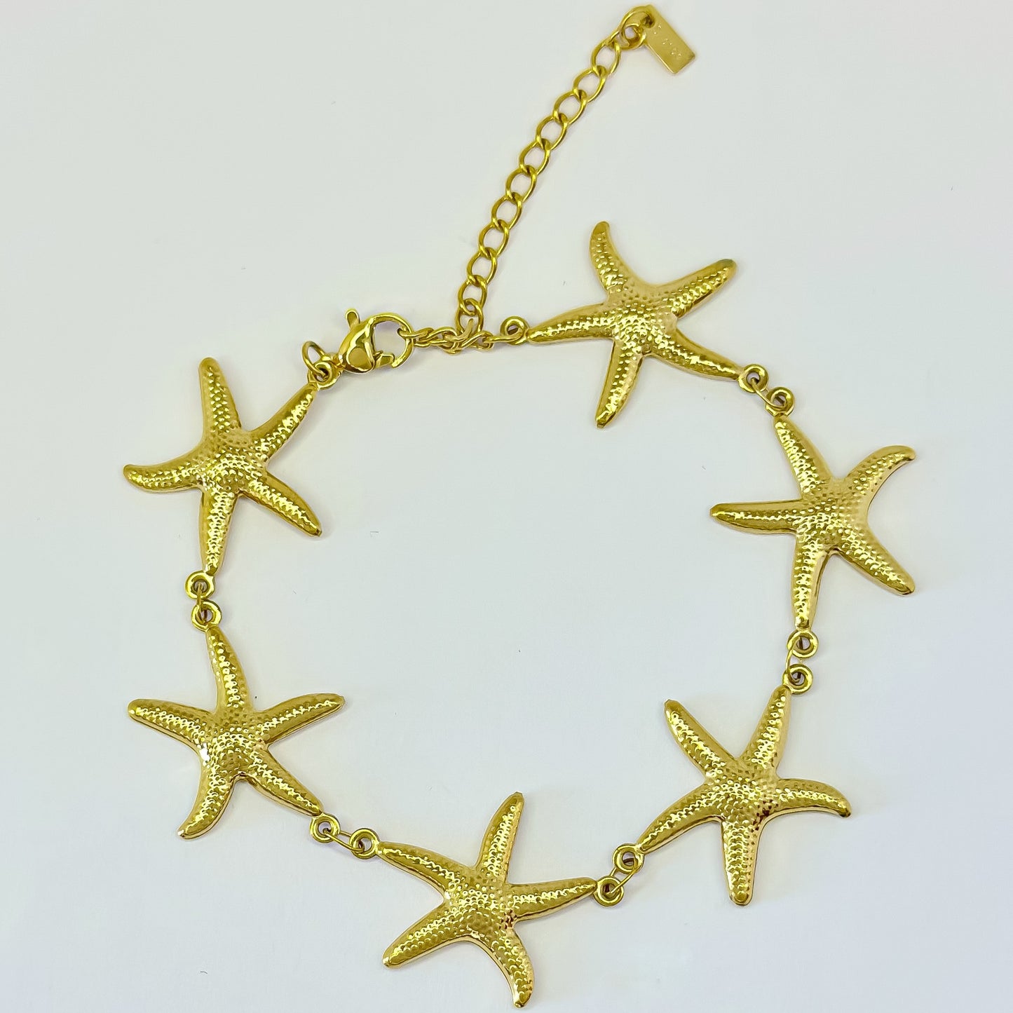 Auksuota apyrankė "Jūros žvaigždutės"