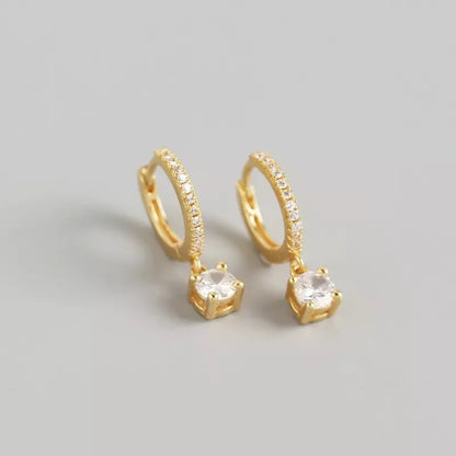 Sidabrinės auksuotos 1,1cm dydžio rinkutės su apvaliu cirkoniu