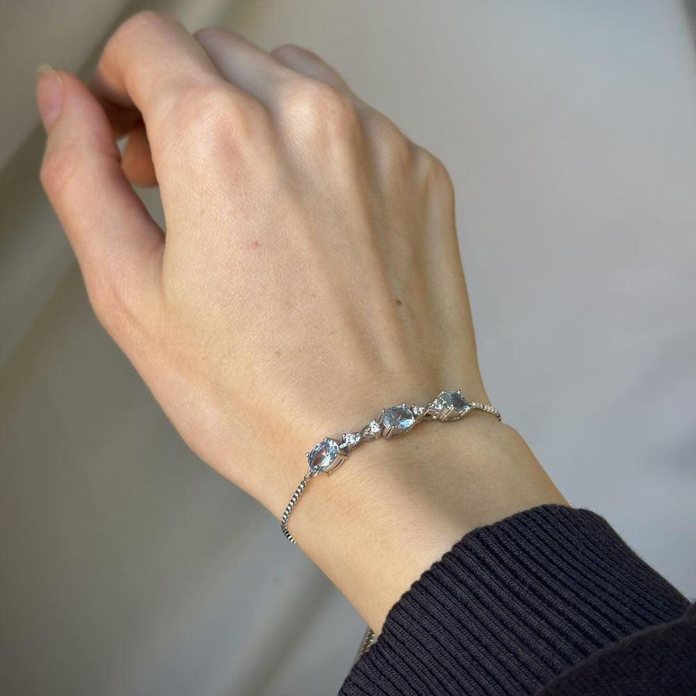 Sterling Silver Rhodium Plated Light Blue CZ Bracelet