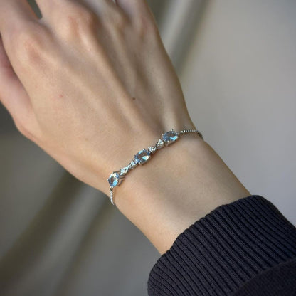 Sterling Silver Rhodium Plated Light Blue CZ Bracelet