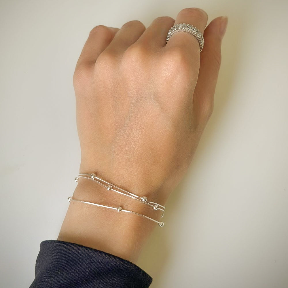 Trijų gijų sidabrinė apyrankė su burbuliukais