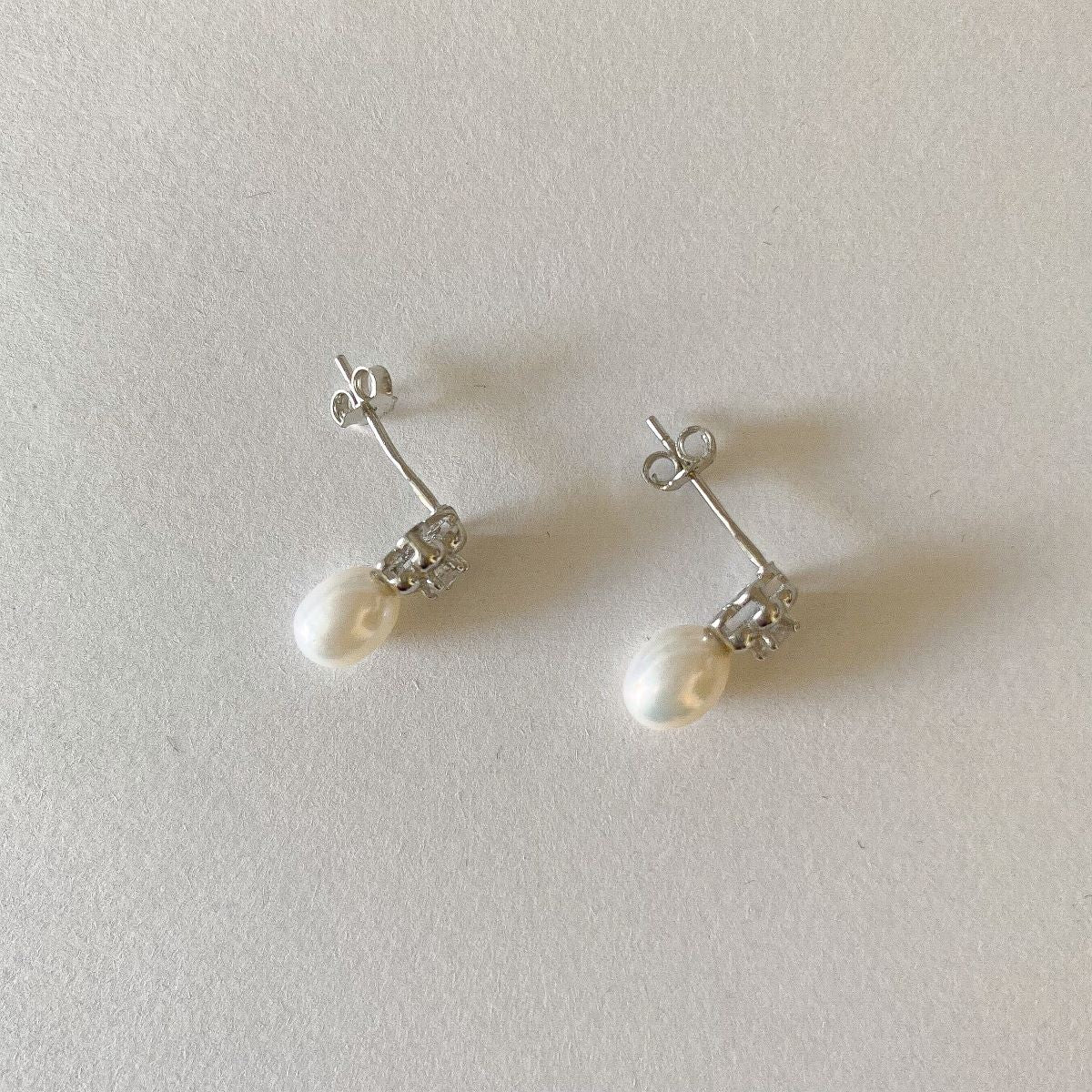 Sterling Silver Rhodium Plated Pearl Studs with CZ