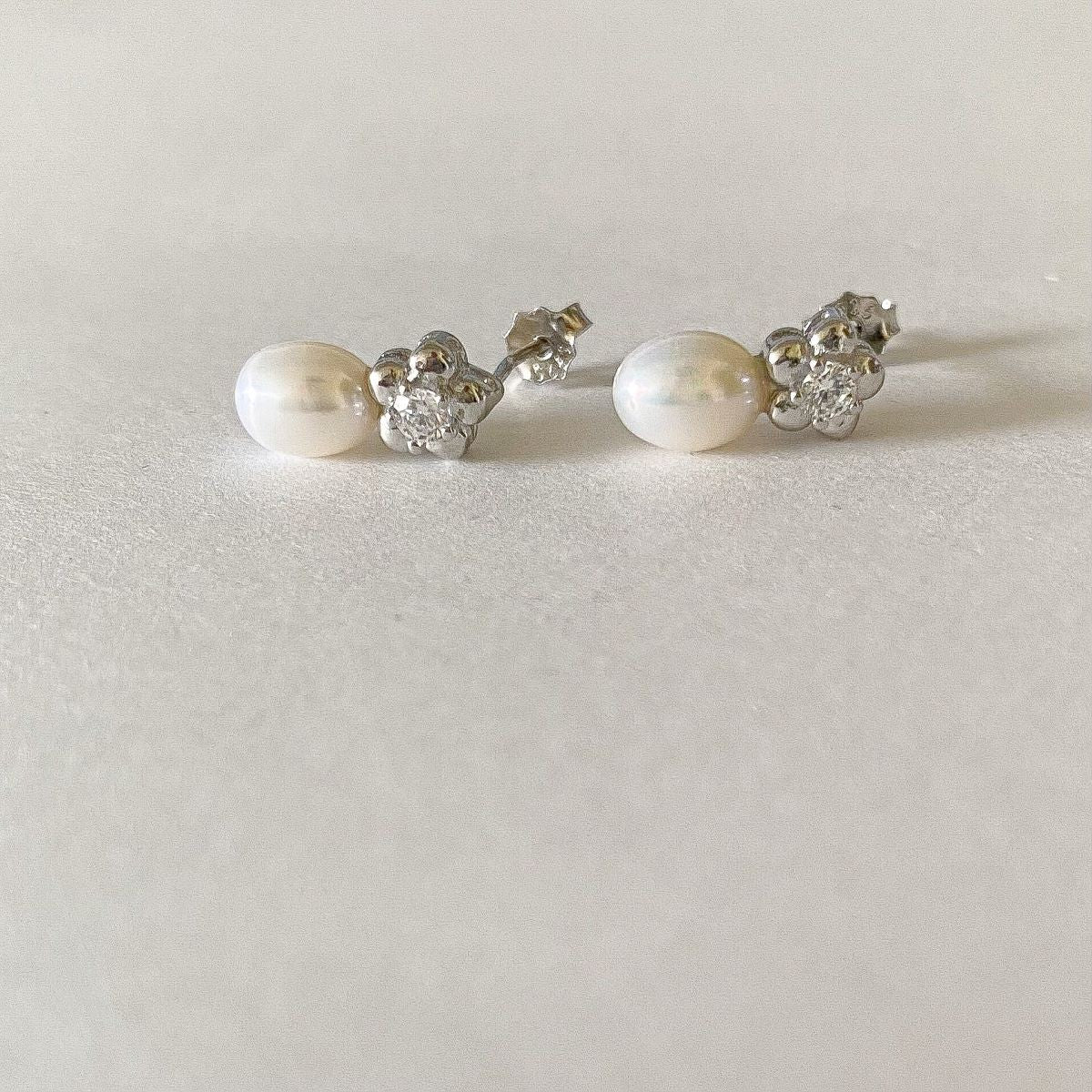 Sterling Silver Rhodium Plated Pearl Studs with CZ