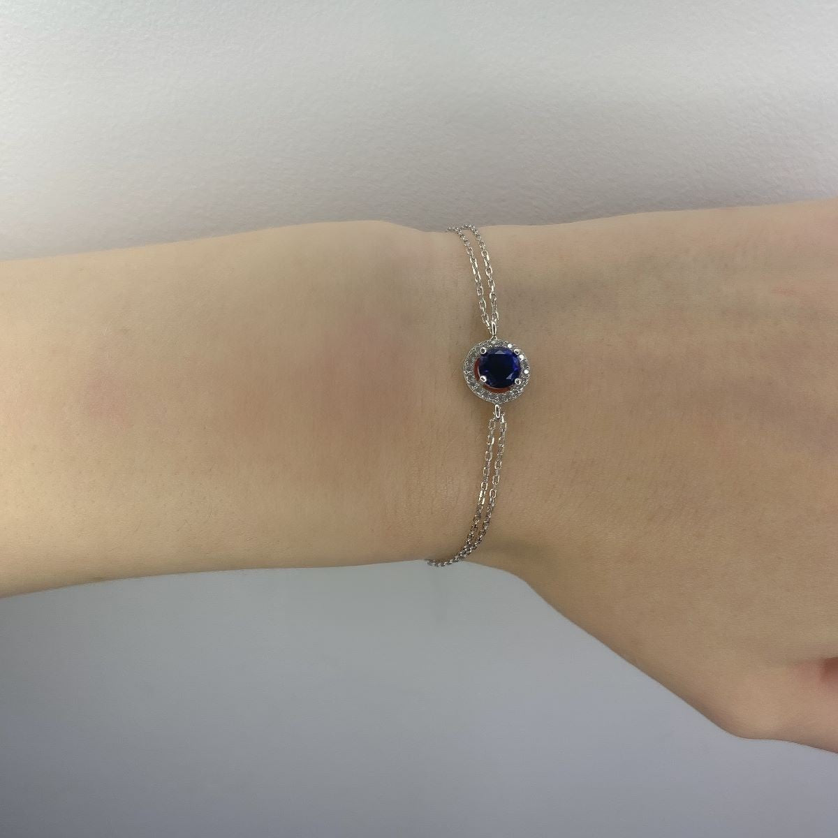 Sterling Silver Rhodium Plated Round Royal Blue CZ Bracelet