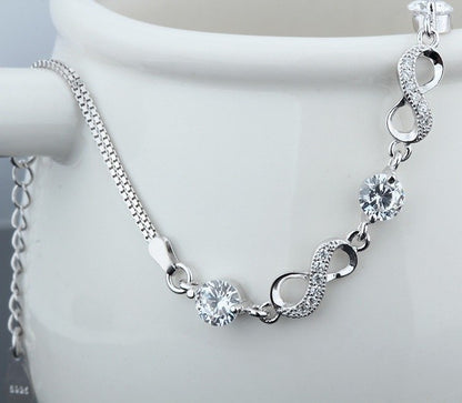 Sterling Silver Rhodium Plated CZ Infinity Bracelet