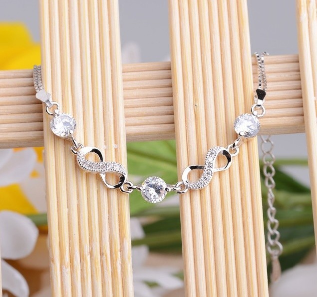 Sterling Silver Rhodium Plated CZ Infinity Bracelet