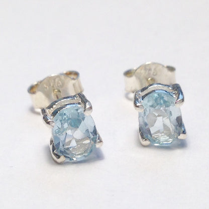 Sterling Silver Oval Blue Topaz Studs