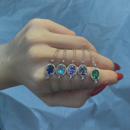 Sidabrinė rodžiuota apyrankė su ovaliu žydru cirkoniu