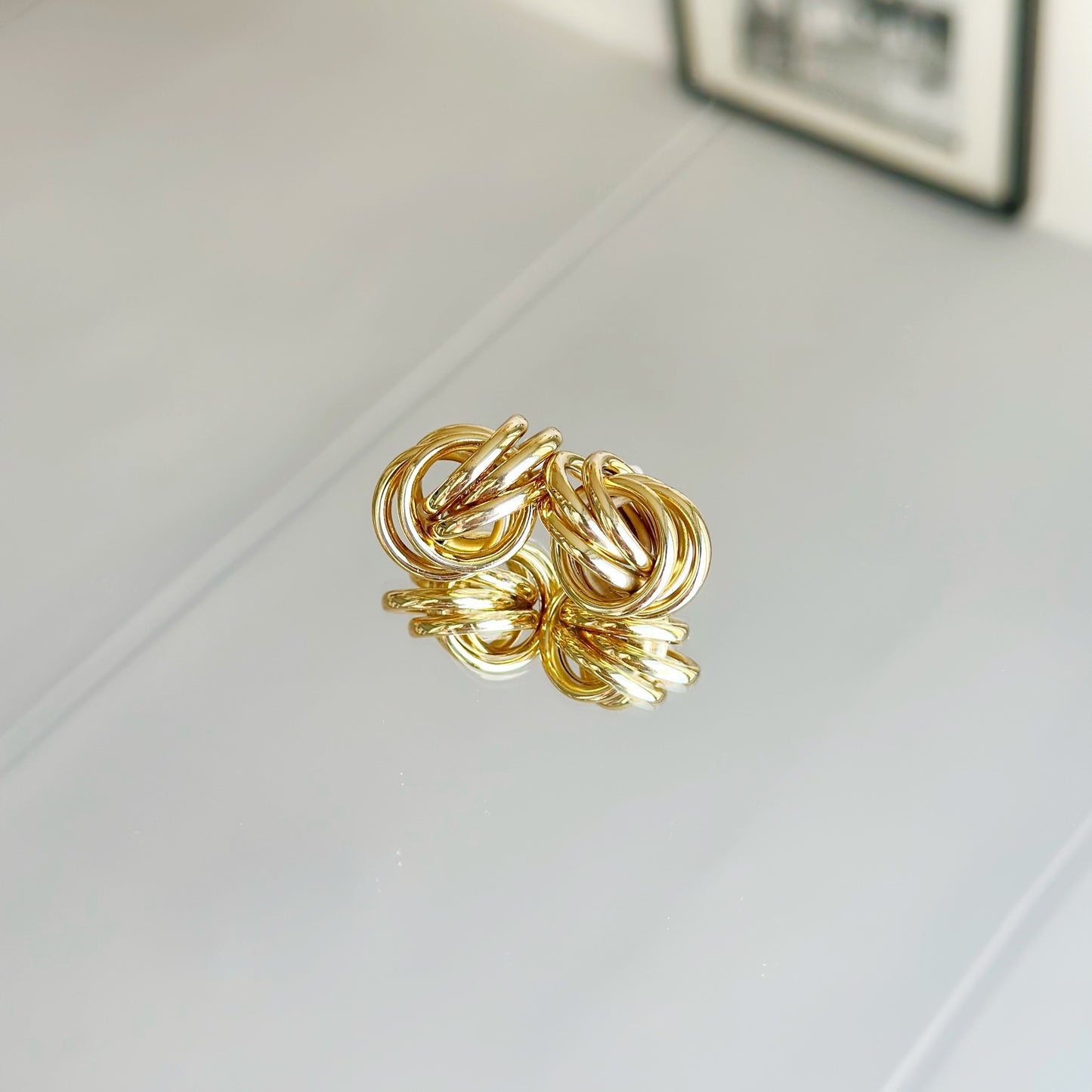 Auksuoti auskarai "Molten Trinity"