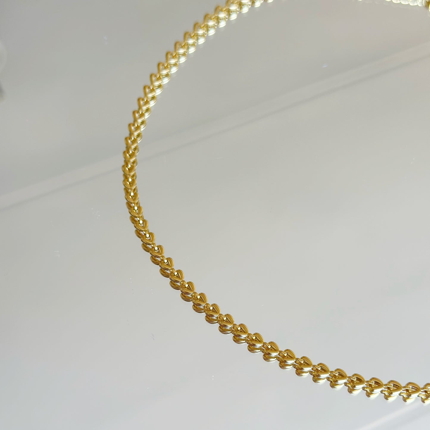 Auksuota kolje su širdelėmis