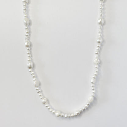 Auksuotas tikrų perlų vėrinys