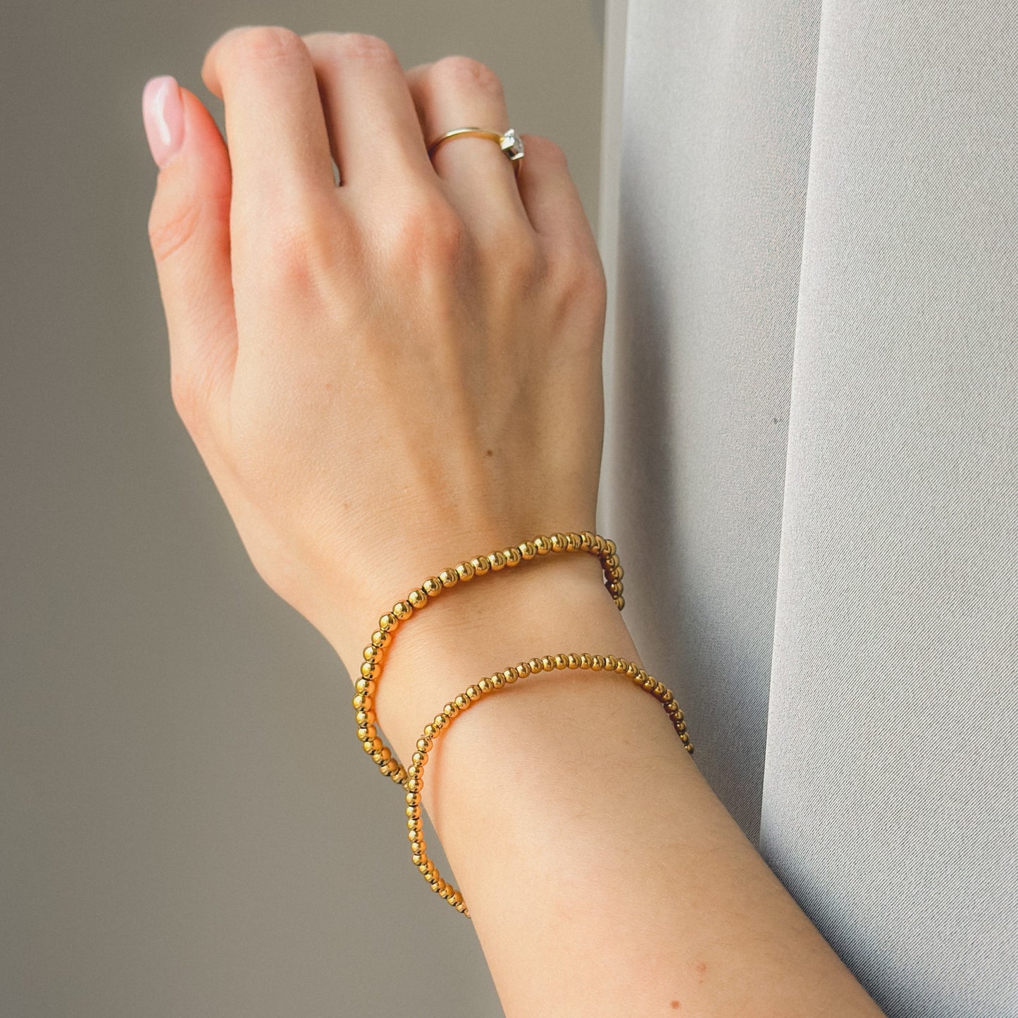 Auksuota apyrankė su burbuliukais