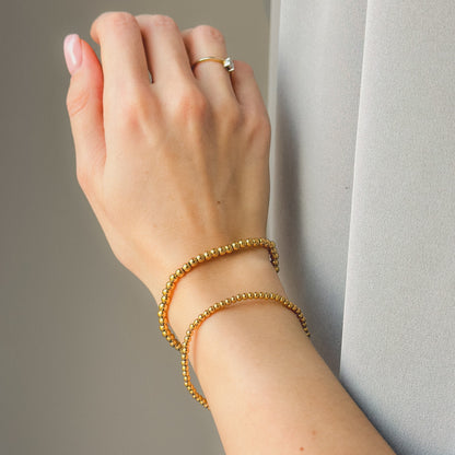 Auksuota apyrankė su burbuliukais