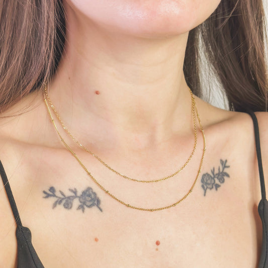 Auksuota dviguba grandinėlė burbuliukais