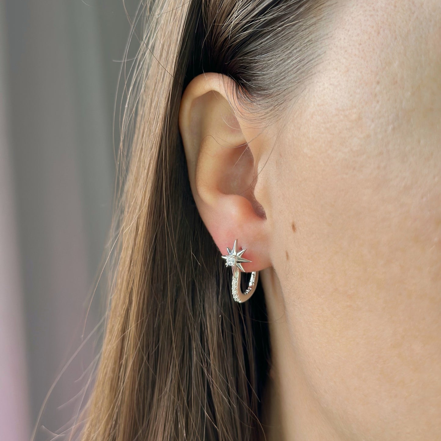 Sidabriniai auskarai su žvaigždute